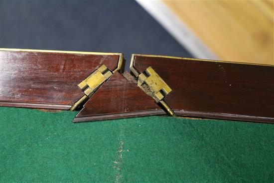 A French brass mounted mahogany envelope card table W.58cm